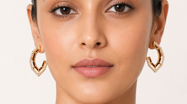 Pavé huggie hoop earrings in 18K gold plating being cared for — Anti-Tarnish Waterproof Jewellery | House of Zena