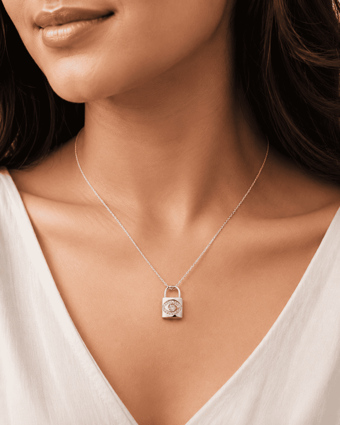 The "Mind Your Business" Padlock — Silver-Tone Lock Evil Eye Necklace by House of Zena, front view