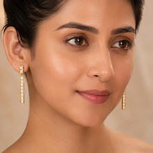 The Champagne Flute Drops — Gold Plated Line Drop Earrings by House of Zena, front view