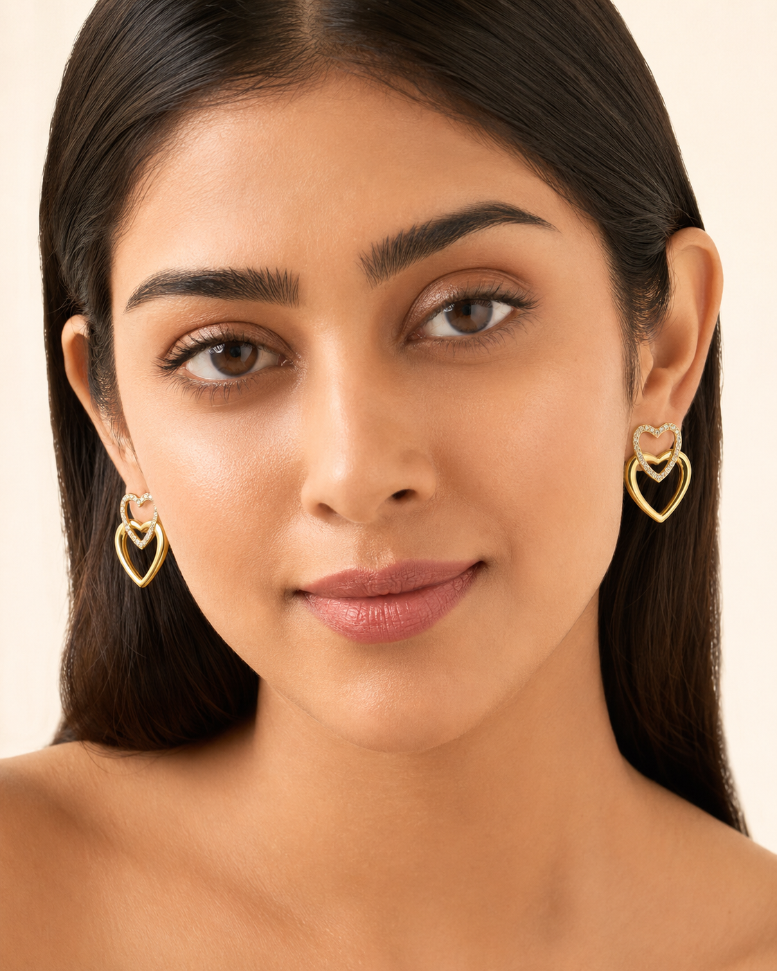 The First Crush Twin Hearts — Gold Plated Twin Heart Earrings by House of Zena, front view