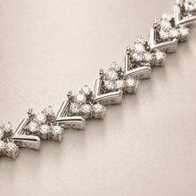 The St. Tropez Chevron Tennis — Silver-Tone Chevron Bracelet by House of Zena, styled on model