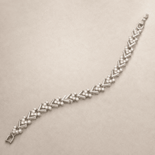 The St. Tropez Chevron Tennis — Silver-Tone Chevron Bracelet by House of Zena, side angle