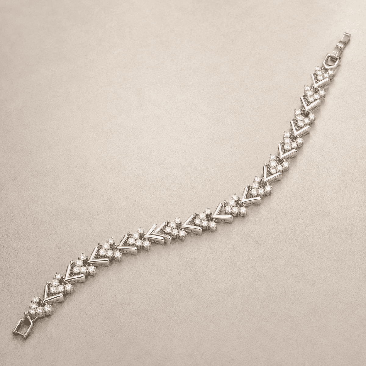 The St. Tropez Chevron Tennis — Silver-Tone Chevron Bracelet by House of Zena, side angle