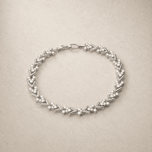 The St. Tropez Chevron Tennis — Silver-Tone Chevron Bracelet by House of Zena, close-up detail