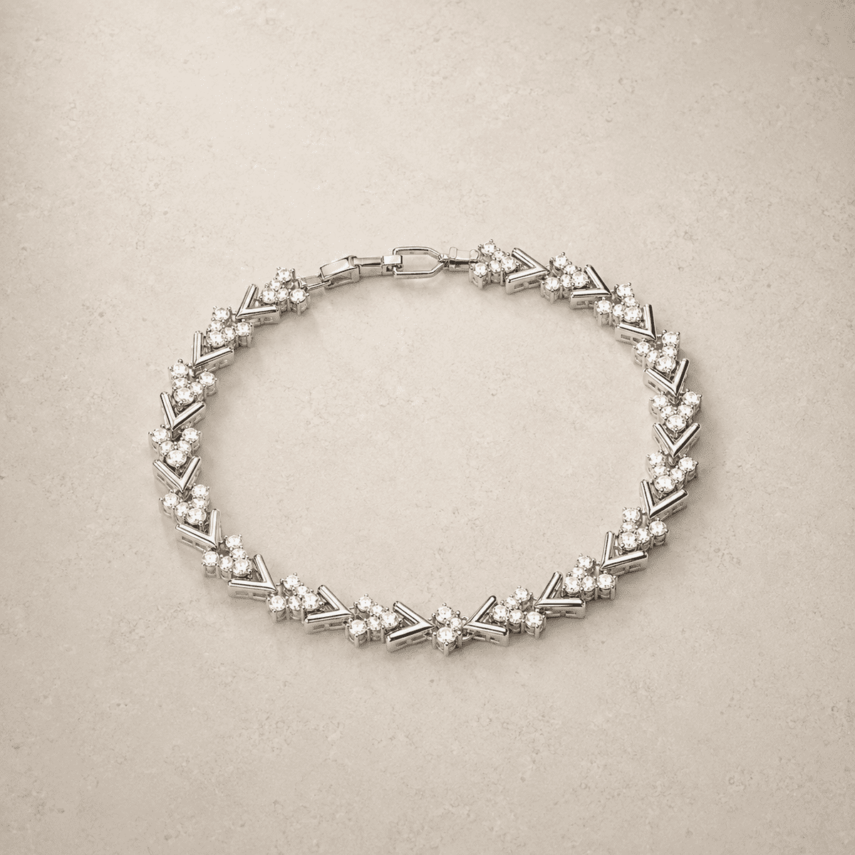 The St. Tropez Chevron Tennis — Silver-Tone Chevron Bracelet by House of Zena, close-up detail
