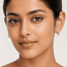 The Strawberry Milk Huggies — Gold Plated Blush Halo Huggie Earrings by House of Zena, front view