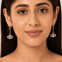 The Side-Eye Charm Drops — Gold Plated Evil Eye Drop Earrings by House of Zena, front view
