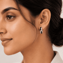 The Black Sesame Crescent Hoops — Silver-Tone Curve Hoop Earrings by House of Zena, front view