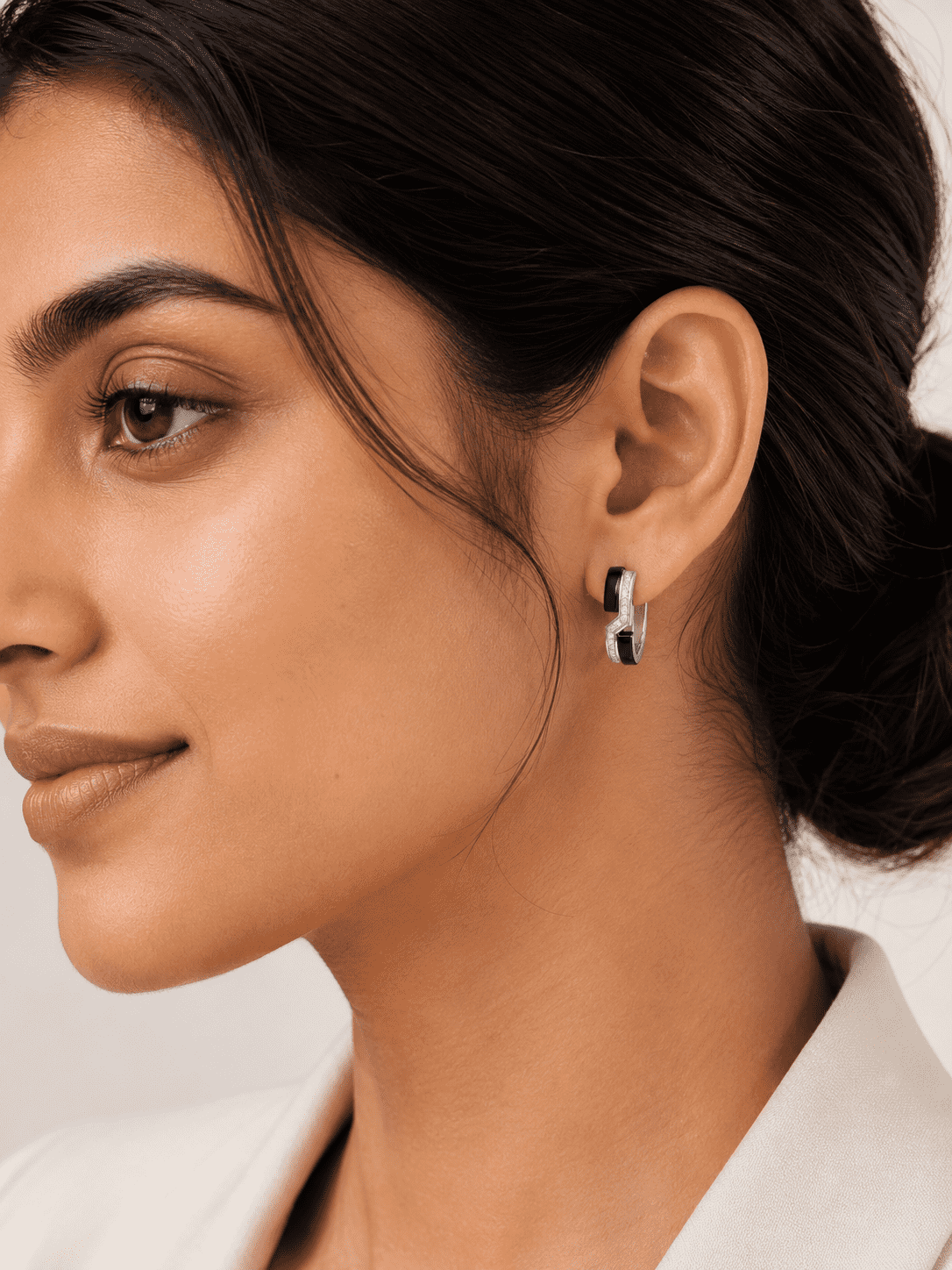 The Black Sesame Crescent Hoops — Silver-Tone Curve Hoop Earrings by House of Zena, front view