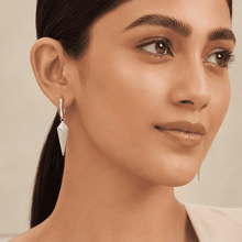 The Diamond Dust Prism Drops — Silver-Tone Silver Prism Luxe Drop Earrings by House of Zena, front view