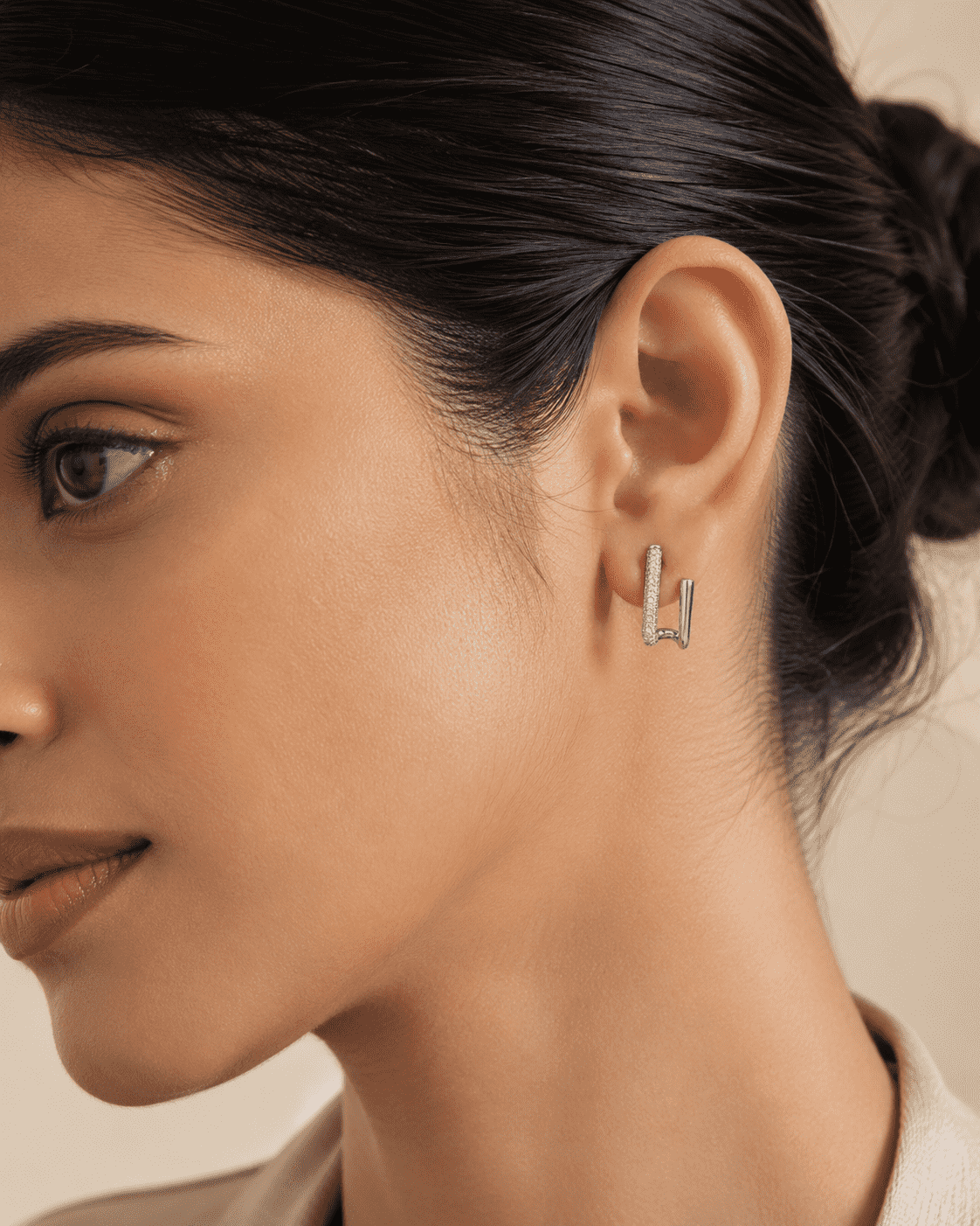 The Crisscross Pavé Illusion Hoops — Silver-Tone Dual Curve Pavé Hoop Earrings by House of Zena, front view