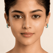 The Capri Blue Mini Hoops — Gold Plated Azure Glow Hoop Earrings by House of Zena, front view