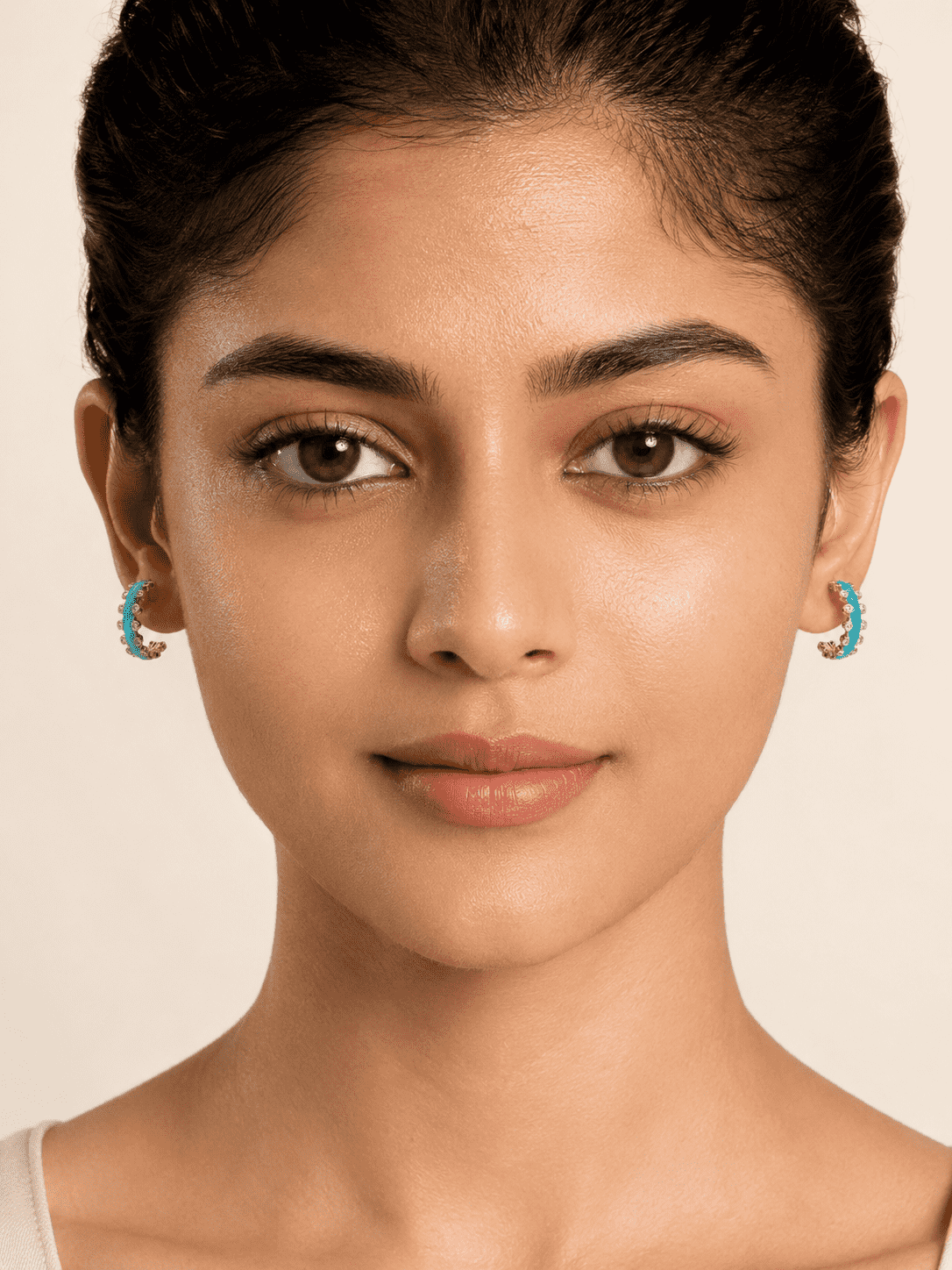 The Capri Blue Mini Hoops — Gold Plated Azure Glow Hoop Earrings by House of Zena, front view