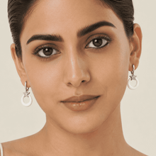 The Happy Tears Solitaire Drops — Silver-Tone Halo Drop Earrings by House of Zena, front view