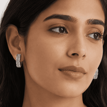 The Waffle Grid Chunky Huggies — Silver-Tone Grid Huggie Earrings by House of Zena, styled on model