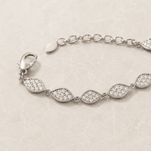 The Olive Branch Charm Bracelet — Silver-Tone Elaria Marquise Charm Bracelet by House of Zena, styled on model