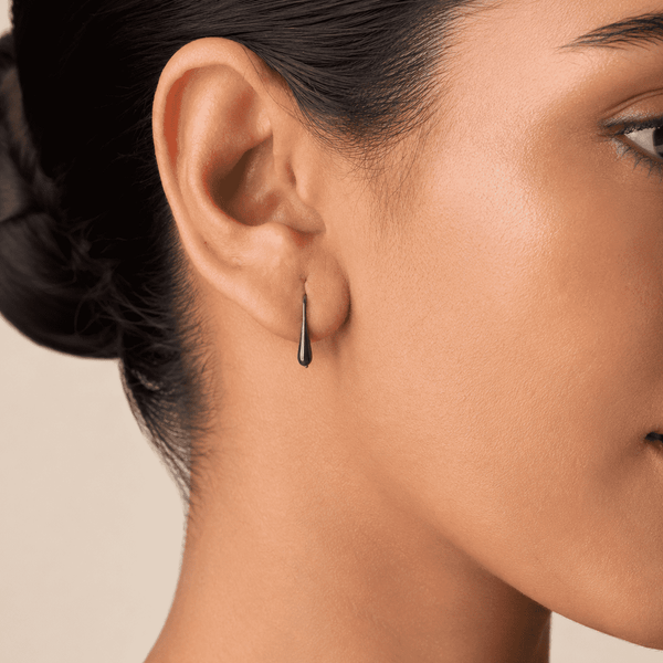 The Green Apple Mini Huggies — Gold Plated Emerald Drop Huggie Earrings by House of Zena, front view — Anti-Tarnish Waterproof Jewellery | House of Zena