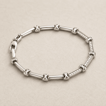 The Café Au Lait Puff Link — Silver-Tone Link Bracelet by House of Zena, styled on model