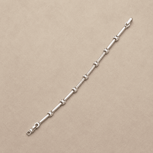The Café Au Lait Puff Link — Silver-Tone Link Bracelet by House of Zena, close-up detail