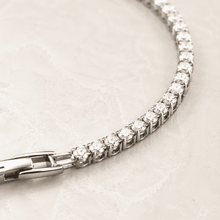 The "Skinny Dip" Tennis Bracelet — Silver-Tone Line Tennis Bracelet by House of Zena, styled on model
