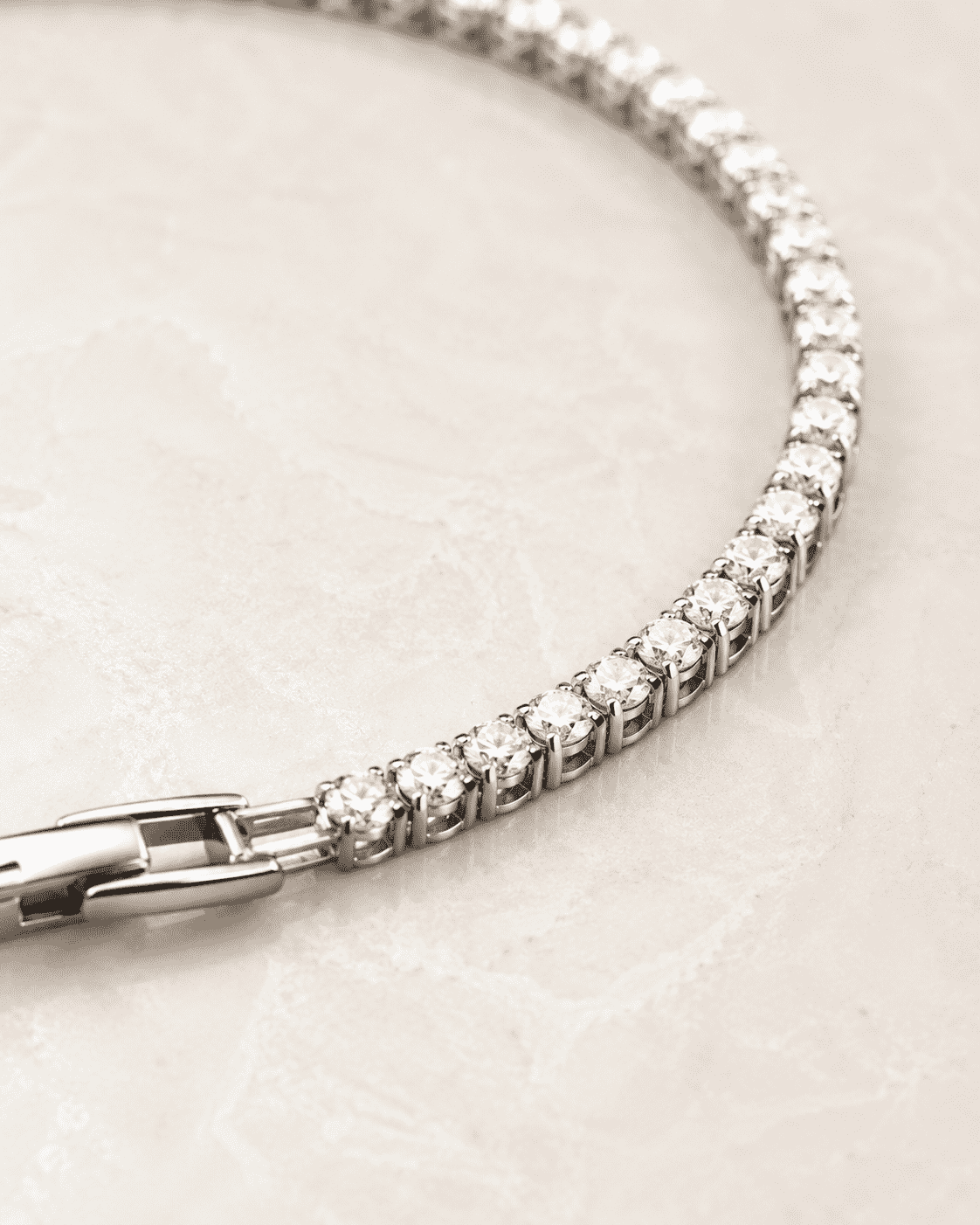 The "Skinny Dip" Tennis Bracelet — Silver-Tone Line Tennis Bracelet by House of Zena, styled on model