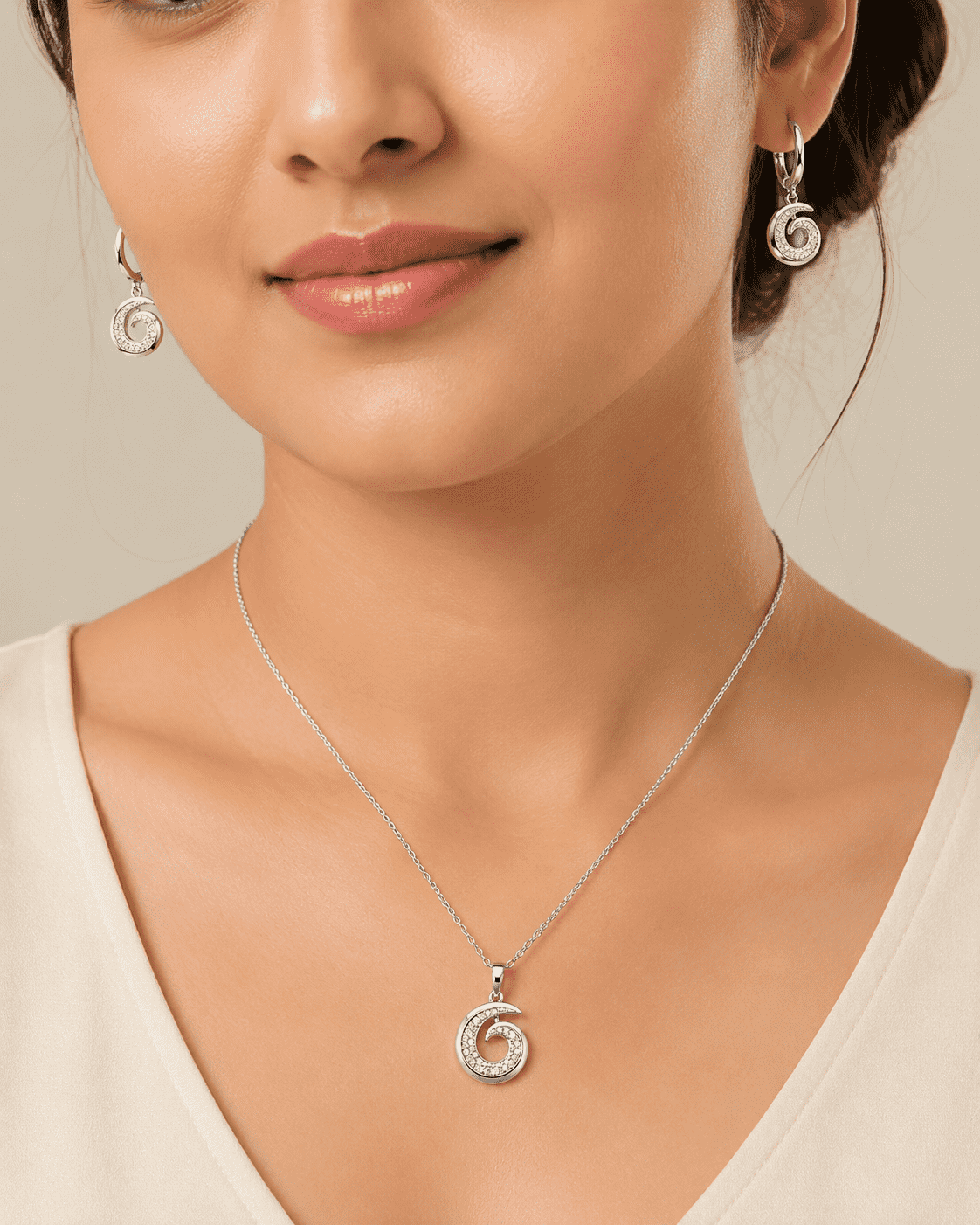 The Cinnamon Roll Spiral Set — Silver-Tone Spiral Pendant Set by House of Zena, front view