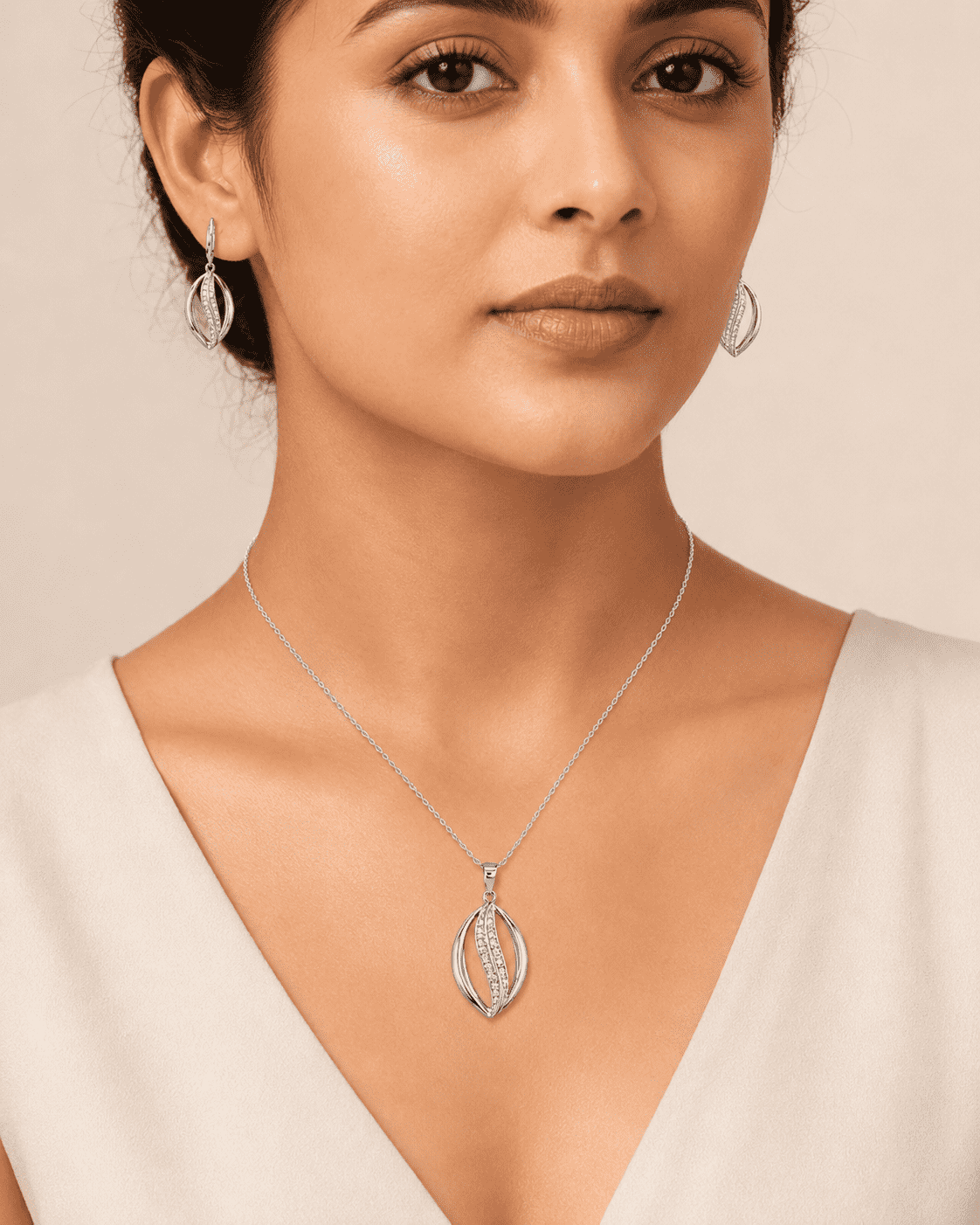 The Melted Honeycomb Set — Gold Plated Wave Pendant Set by House of Zena, front view