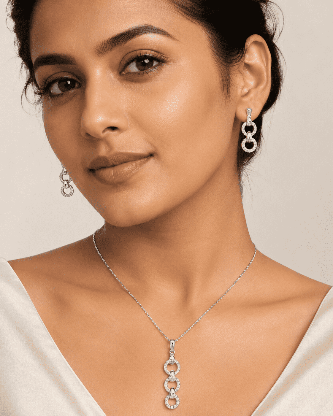 The "You & Me" Interlock Set — Silver-Tone Link Pendant Set by House of Zena, front view