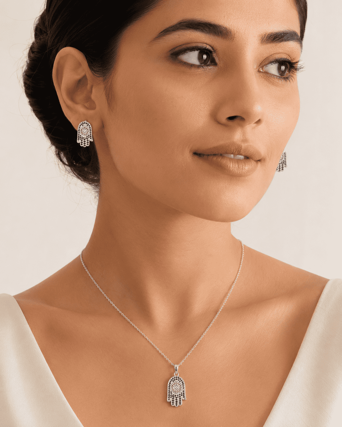 The "Good Karma Only" Hamsa Set — Silver-Tone Hamsa Pendant Set by House of Zena, front view