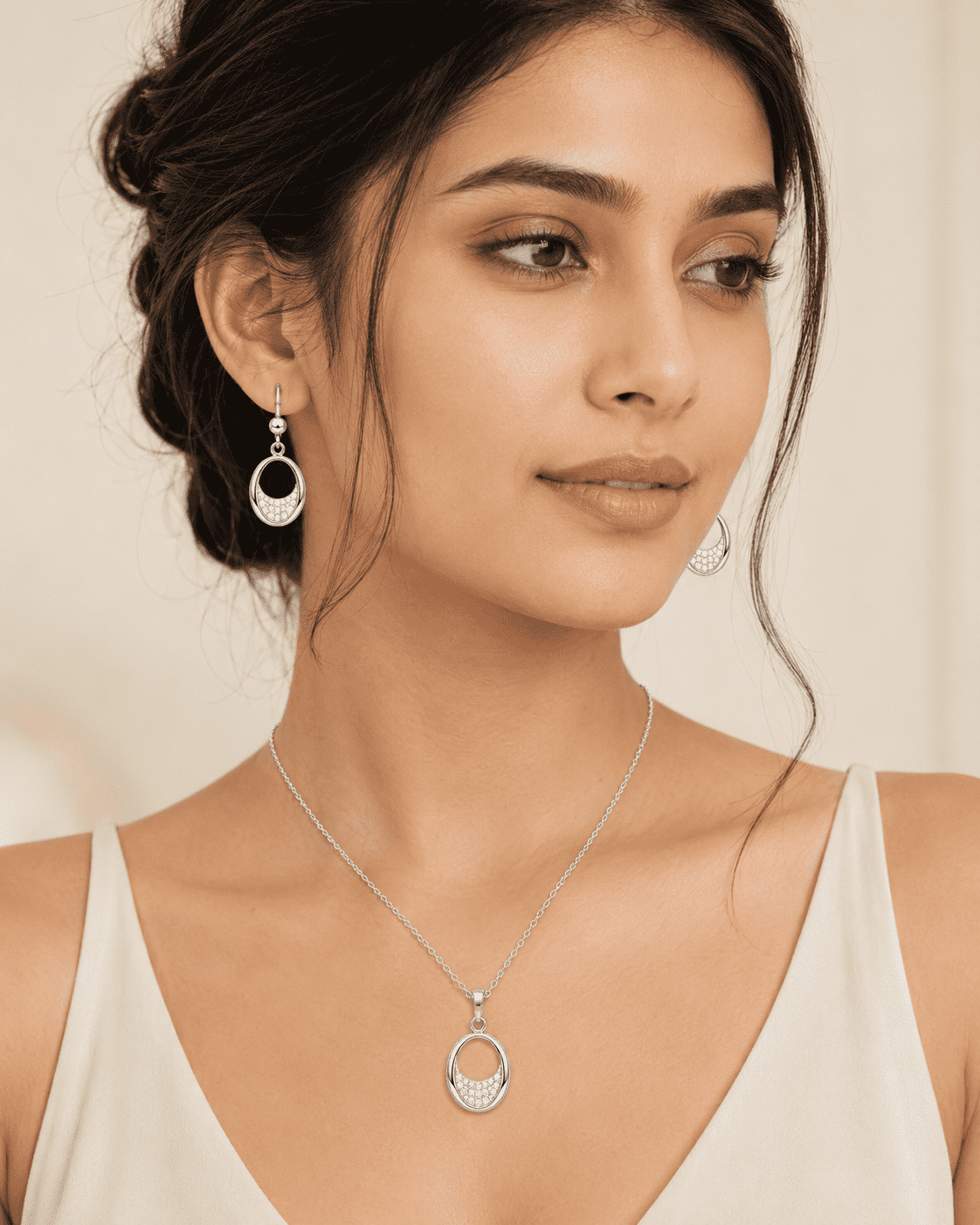 The Almond Truffle Solitaire Set — Silver-Tone Oval Pendant Set by House of Zena, front view