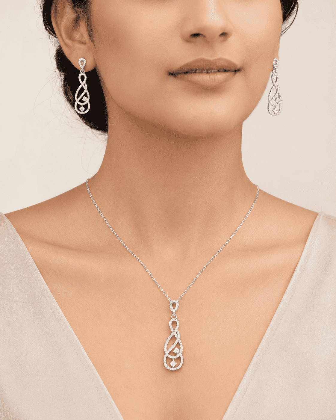 The "Pinky Promise" Infinity Set — Silver-Tone Infinity Grace Pendant Set by House of Zena, front view