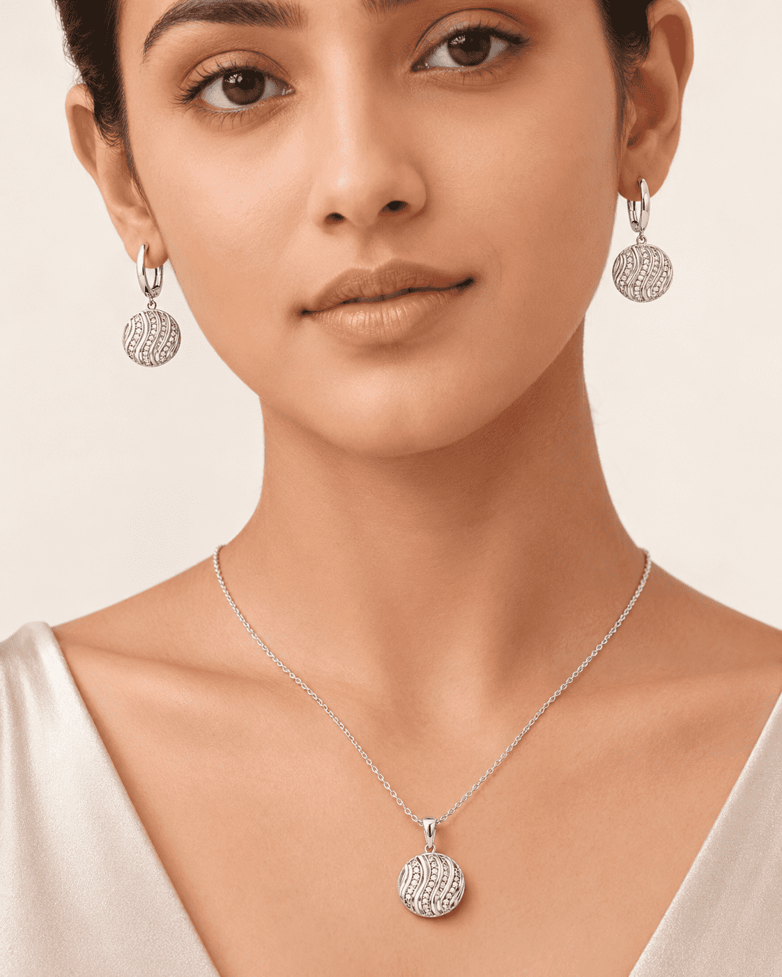 The Golden Hour Ripple Set — Silver-Tone Wave Pendant Set by House of Zena, front view
