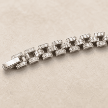 The 9-to-5 Paperclip Chain (Silver) — Silver-Tone Noiré Link Bracelet by House of Zena, styled on model