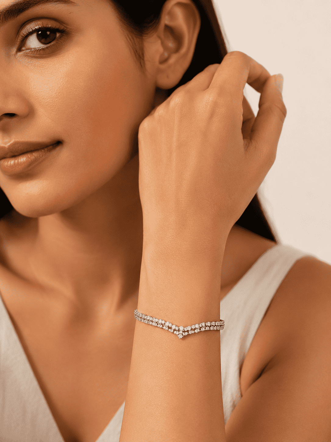 The Croissant Tennis Bangle — Silver-Tone Twist Tennis Bangle by House of Zena, front view