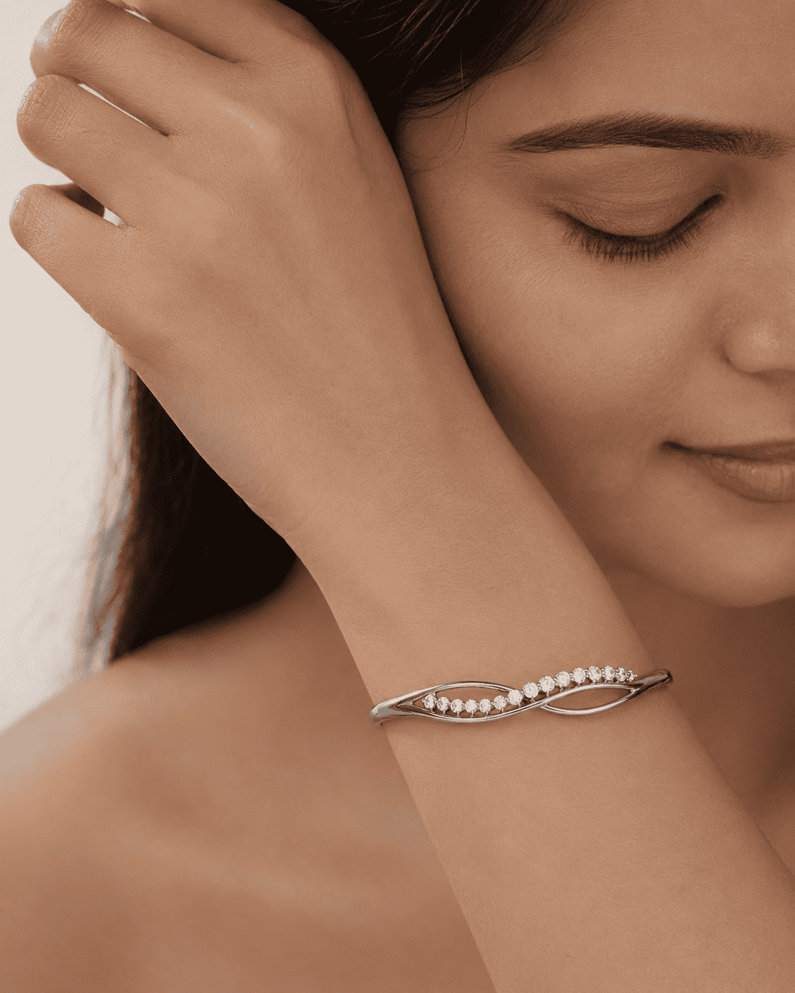 The "Forever Yours" Infinity Bangle — Silver-Tone Infinity Bangle by House of Zena, front view