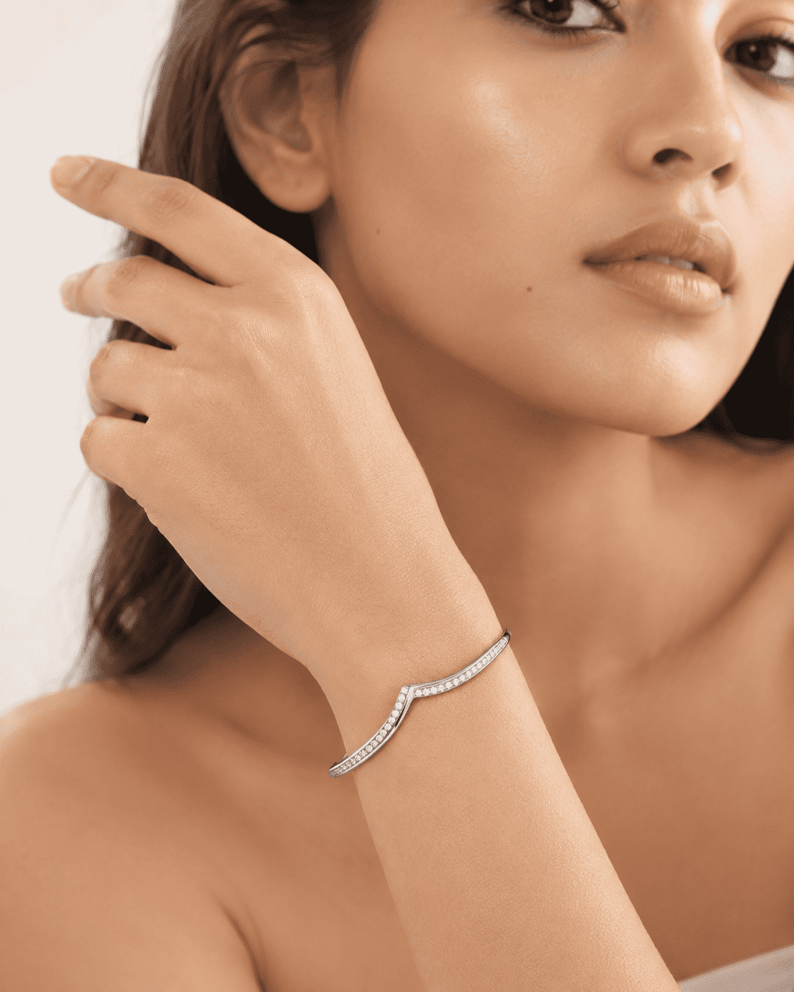 The "Kiss Me" Crisscross Bangle — Silver-Tone Twist Pavé Bangle by House of Zena, front view