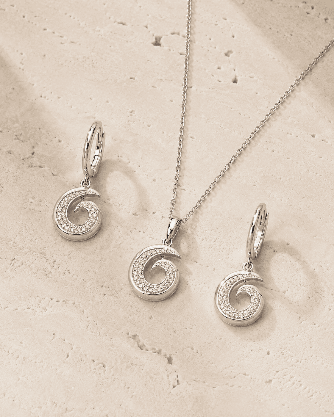 The Cinnamon Roll Spiral Set — Silver-Tone Spiral Pendant Set by House of Zena, side angle