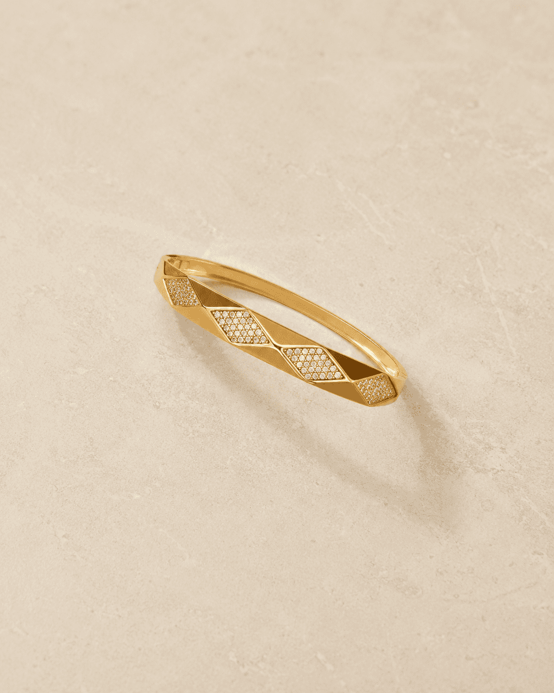 The Diamond Cut Mirror Bangle — Gold Plated Prism Bangle by House of Zena, worn on model