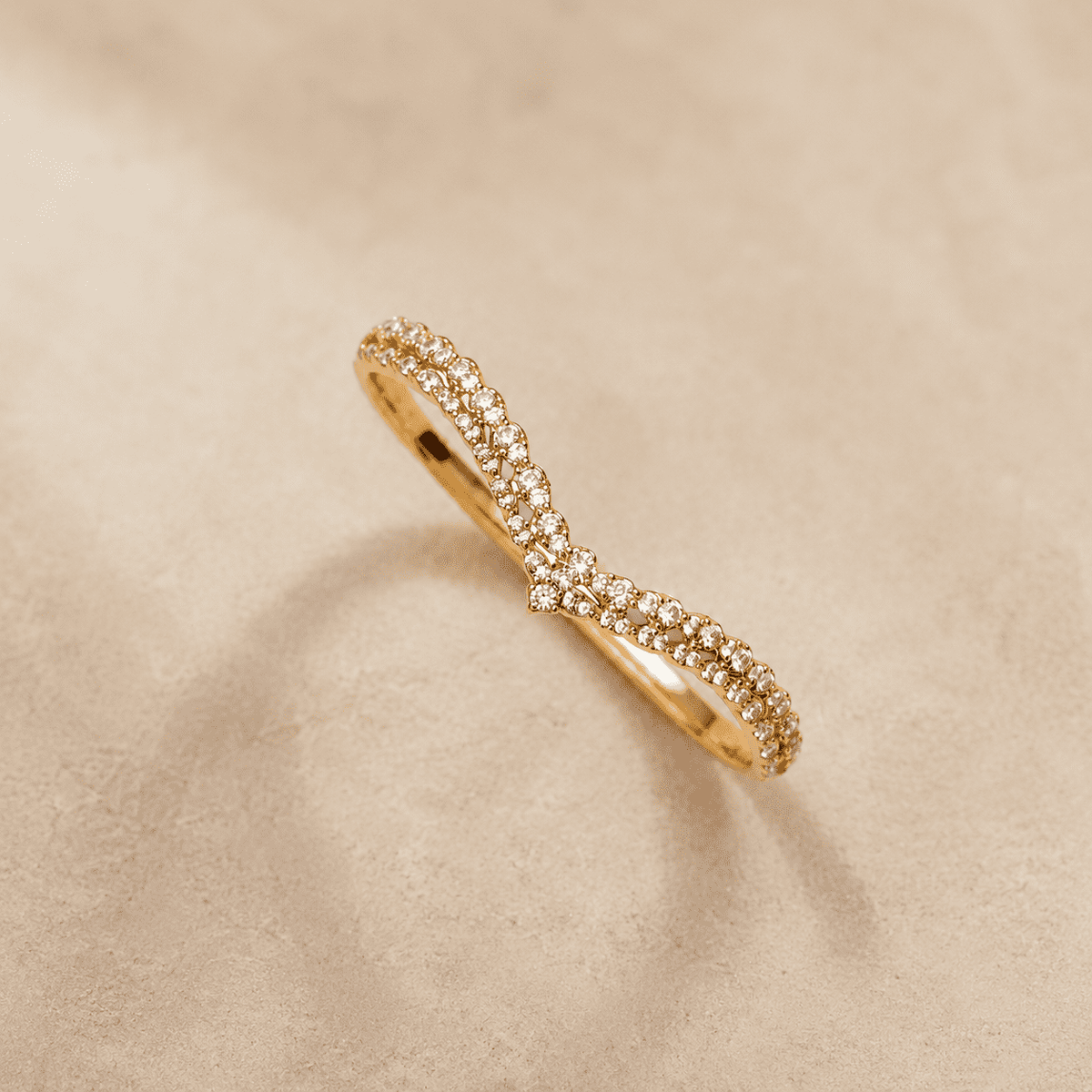 The French Cruller Twist Bangle — Gold Plated Infinity Twist Bangle by House of Zena, side angle