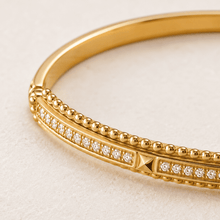 The Caviar Bead Bangle — Gold Plated Studline Bangle by House of Zena, styled on model