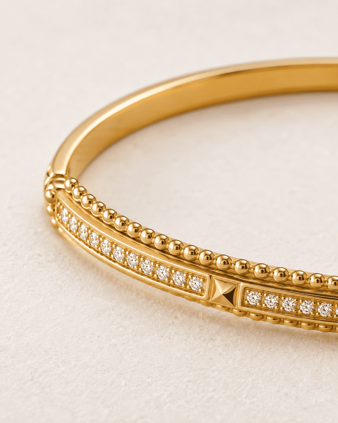 The Caviar Bead Bangle — Gold Plated Studline Bangle by House of Zena, styled on model