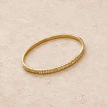 The Caviar Bead Bangle — Gold Plated Studline Bangle by House of Zena, worn on model
