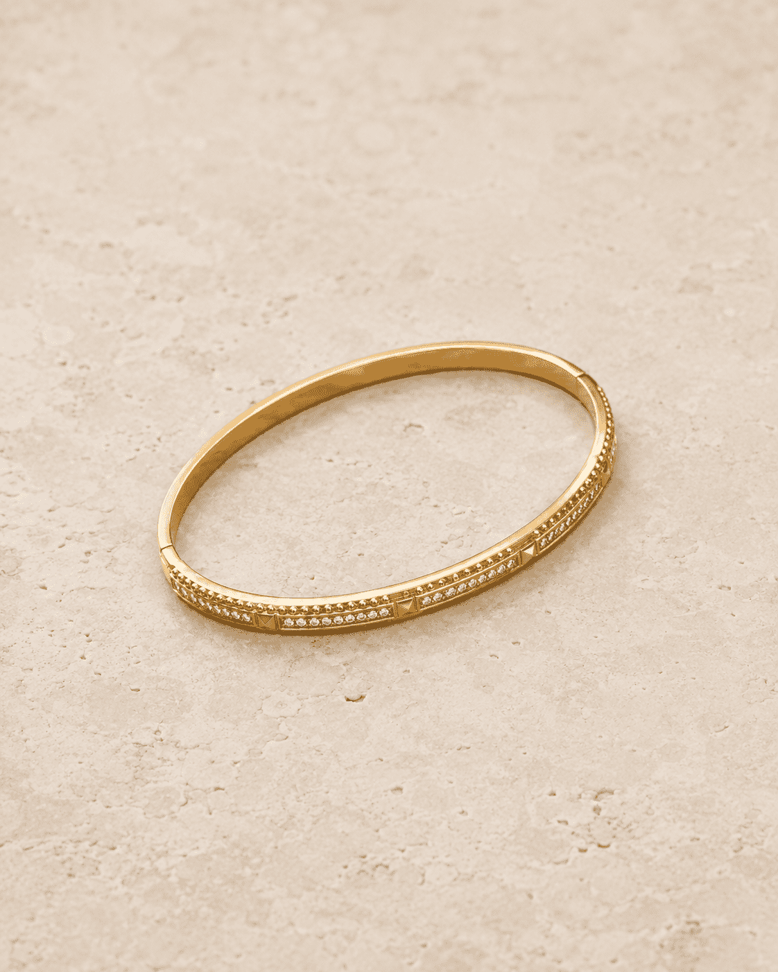 The Caviar Bead Bangle — Gold Plated Studline Bangle by House of Zena, worn on model
