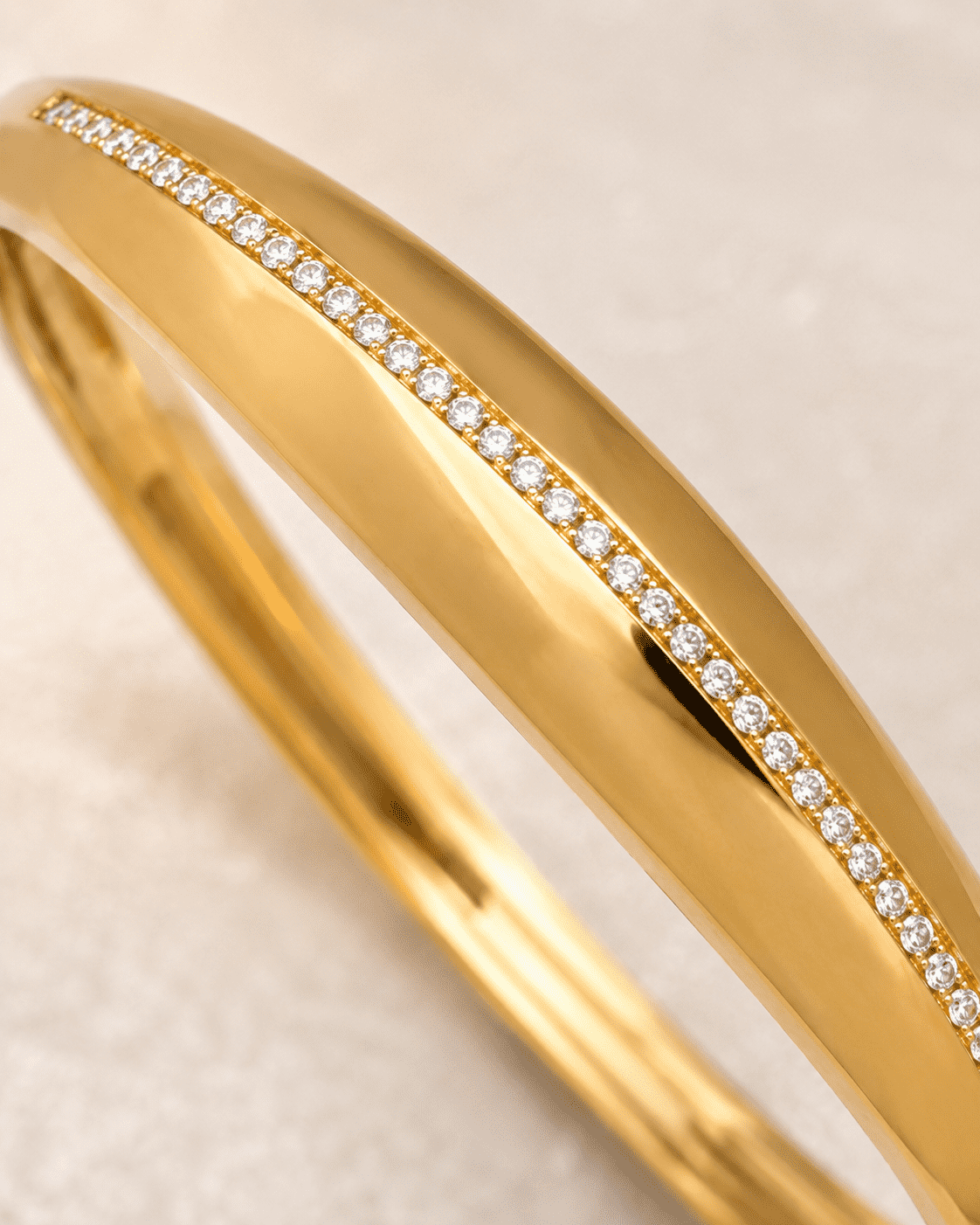 The Date Night Solitaire Bangle — Gold Plated Linea Bangle by House of Zena, styled on model