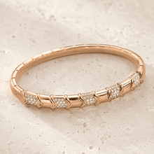 The Wishbone Chevron Bangle — Gold Plated Chevron Pavé Bangle by House of Zena, worn on model