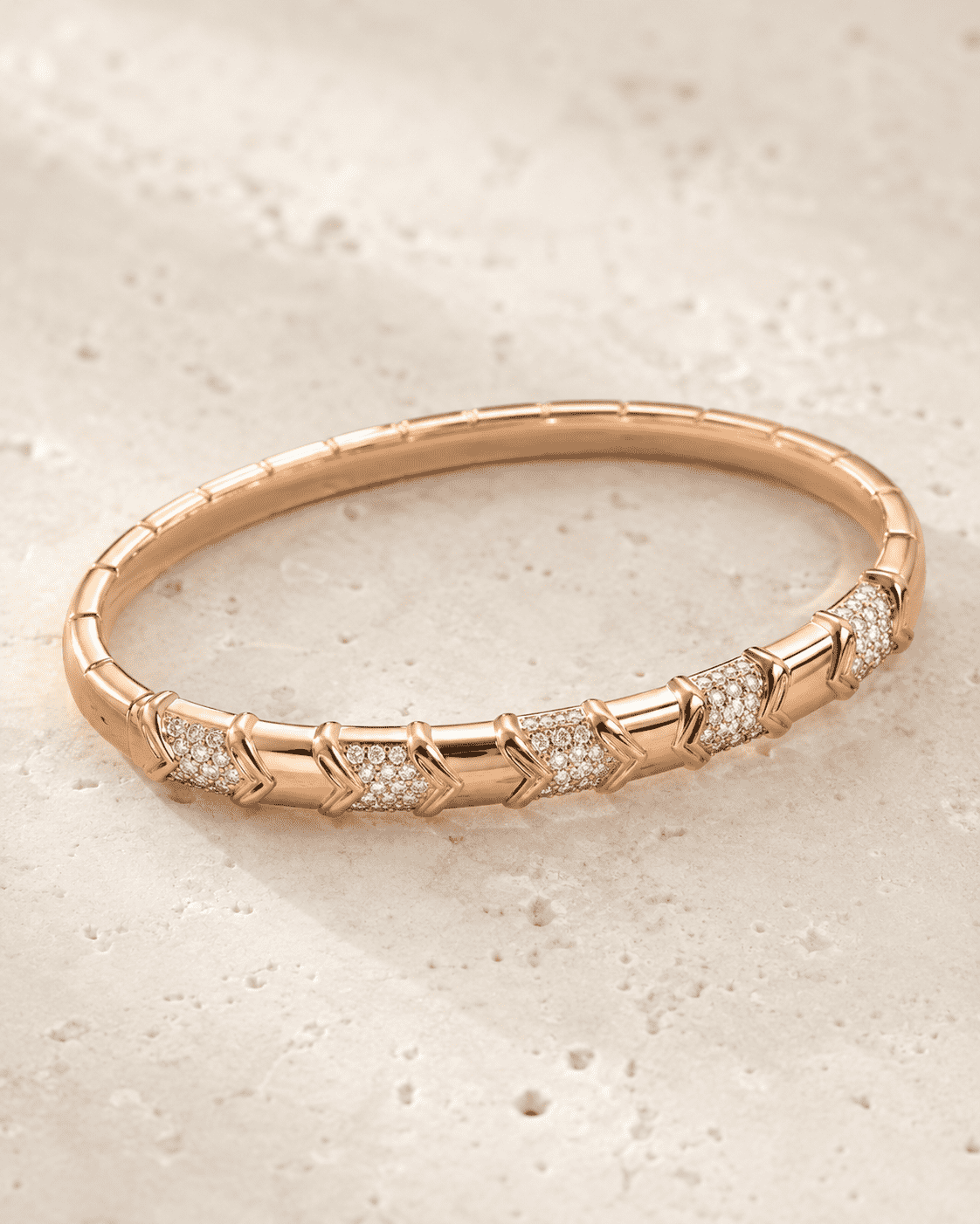 The Wishbone Chevron Bangle — Gold Plated Chevron Pavé Bangle by House of Zena, worn on model