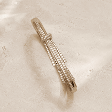 The Silk Ribbon Pavé Bangle — Gold Plated Ribbon Pavé Bangle by House of Zena, worn on model
