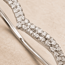 The Croissant Tennis Bangle — Silver-Tone Twist Tennis Bangle by House of Zena, styled on model