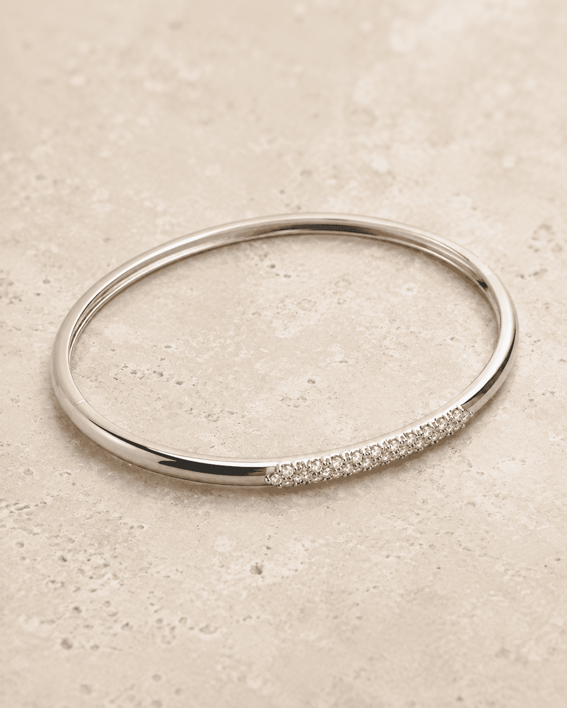 The Skinny Dip Stacking Bangle — Silver-Tone Slim Pavé Bangle by House of Zena, worn on model