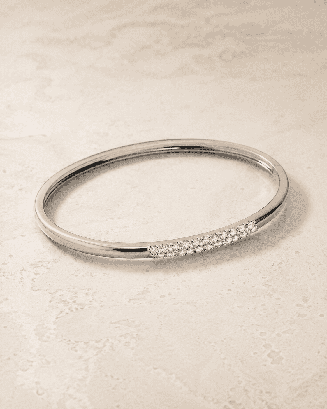 The Skinny Dip Stacking Bangle — Silver-Tone Slim Pavé Bangle by House of Zena, side angle